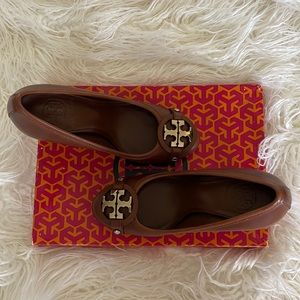 Tory Burch brown leather pumps.